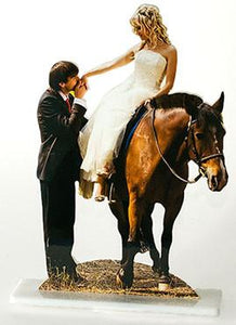 Groom kissing bride's hand while she sits on a horse - Photo cutout cake topper.